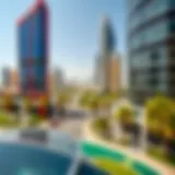 A panoramic view of Motorcity showcasing its modern architecture and green spaces.