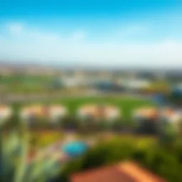 Panoramic view of Wasl Ras Al Khor showcasing modern architecture and lush greenery.