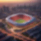 An aerial view of a modern sports city with a football stadium