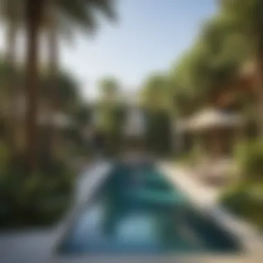 Lush Poolside Living at Wasl - Samari Residences Luxurious swimming pool area surrounded by lush greenery at Wasl - Samari Residences